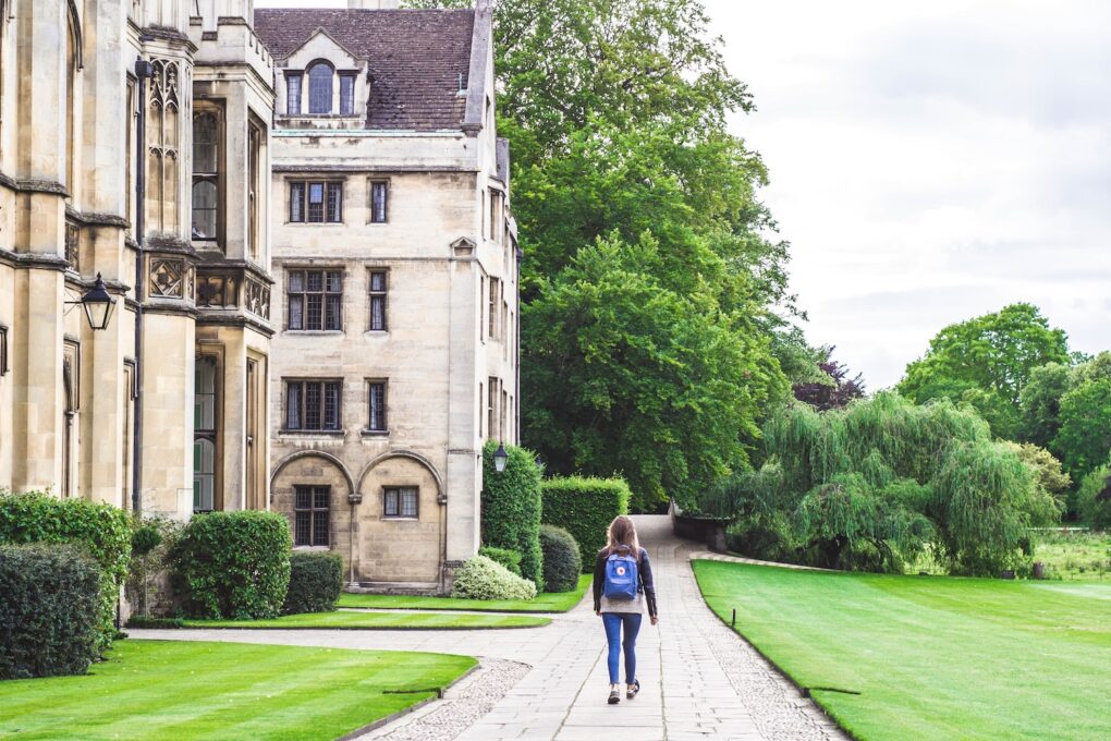 decorative, woman walking on a college campus
