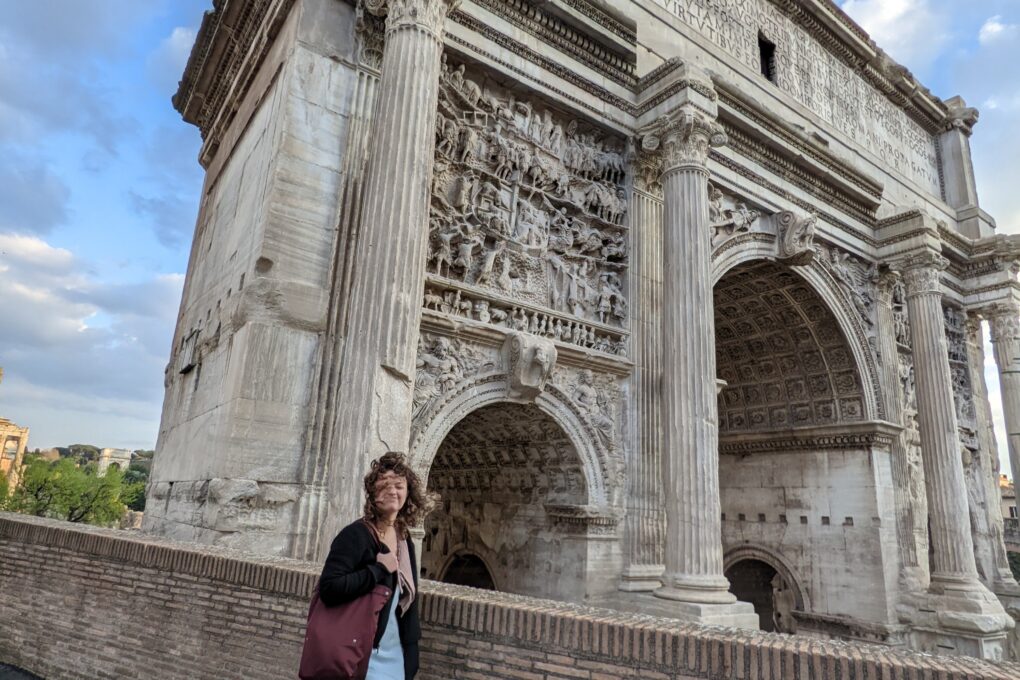 Kate in front of an old building
